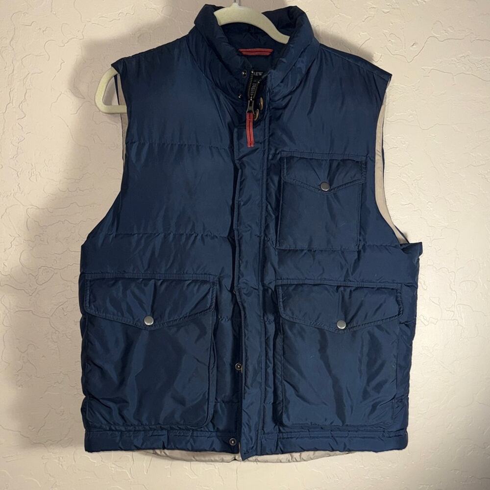 J. Crew men’s blue down filled puff vest size medium.